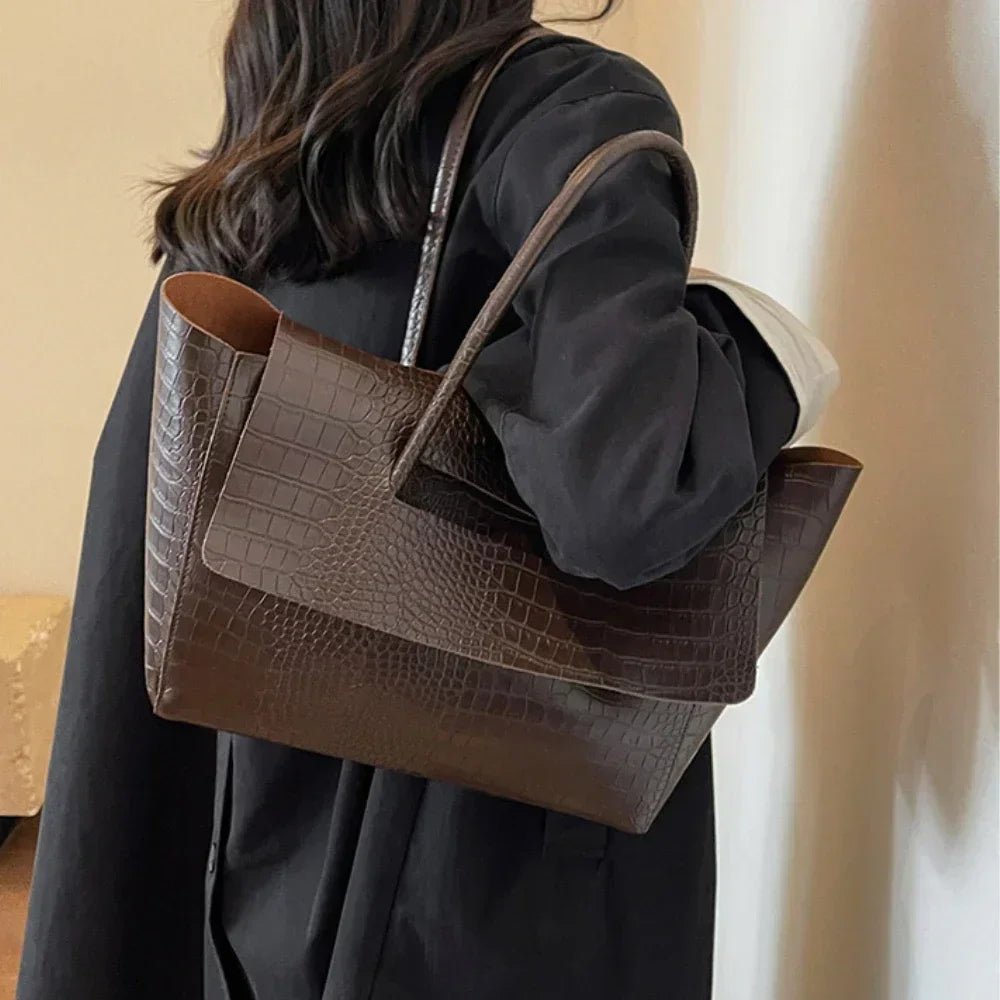 Jessica Kabartmalı Deri El Çantası